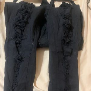 Black ripped overall jeans